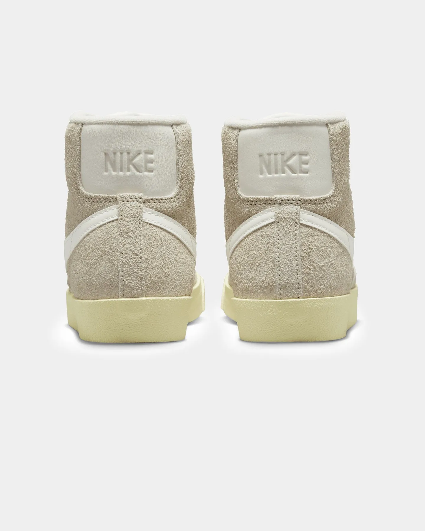 Nike Women's Blazer Mid '77 Vintage Light Bone/Sail Torque Control Frame running in a butte area shoes