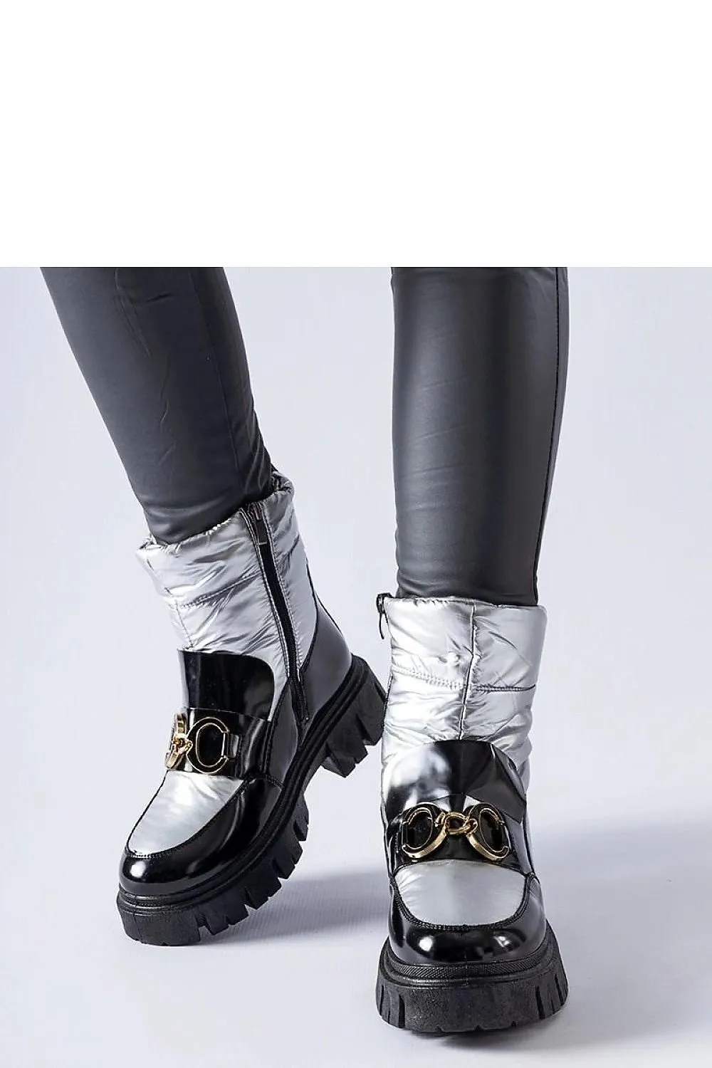 Black and silver lacquered snow boots