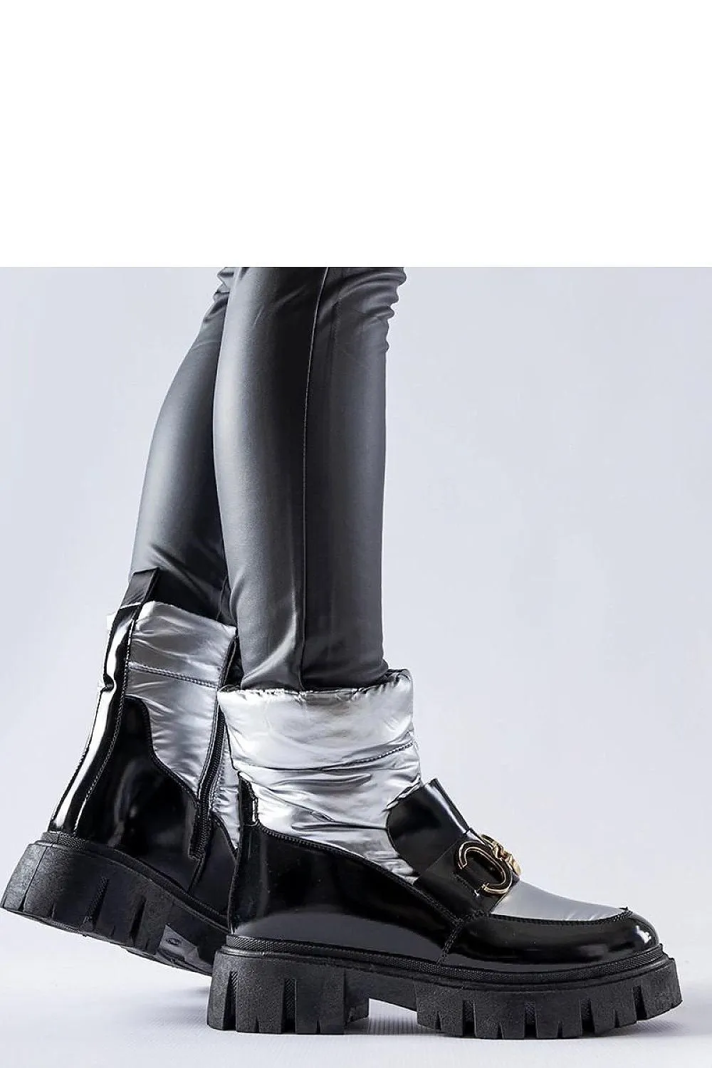 Black and silver lacquered snow boots