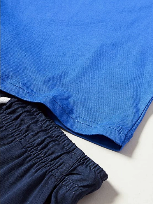 Slim Silhouette Bold Look Champion completino da ragazzo Legacy Graphic T-shirt   Bermuda 306315 BS071 ETR bluette-navy
