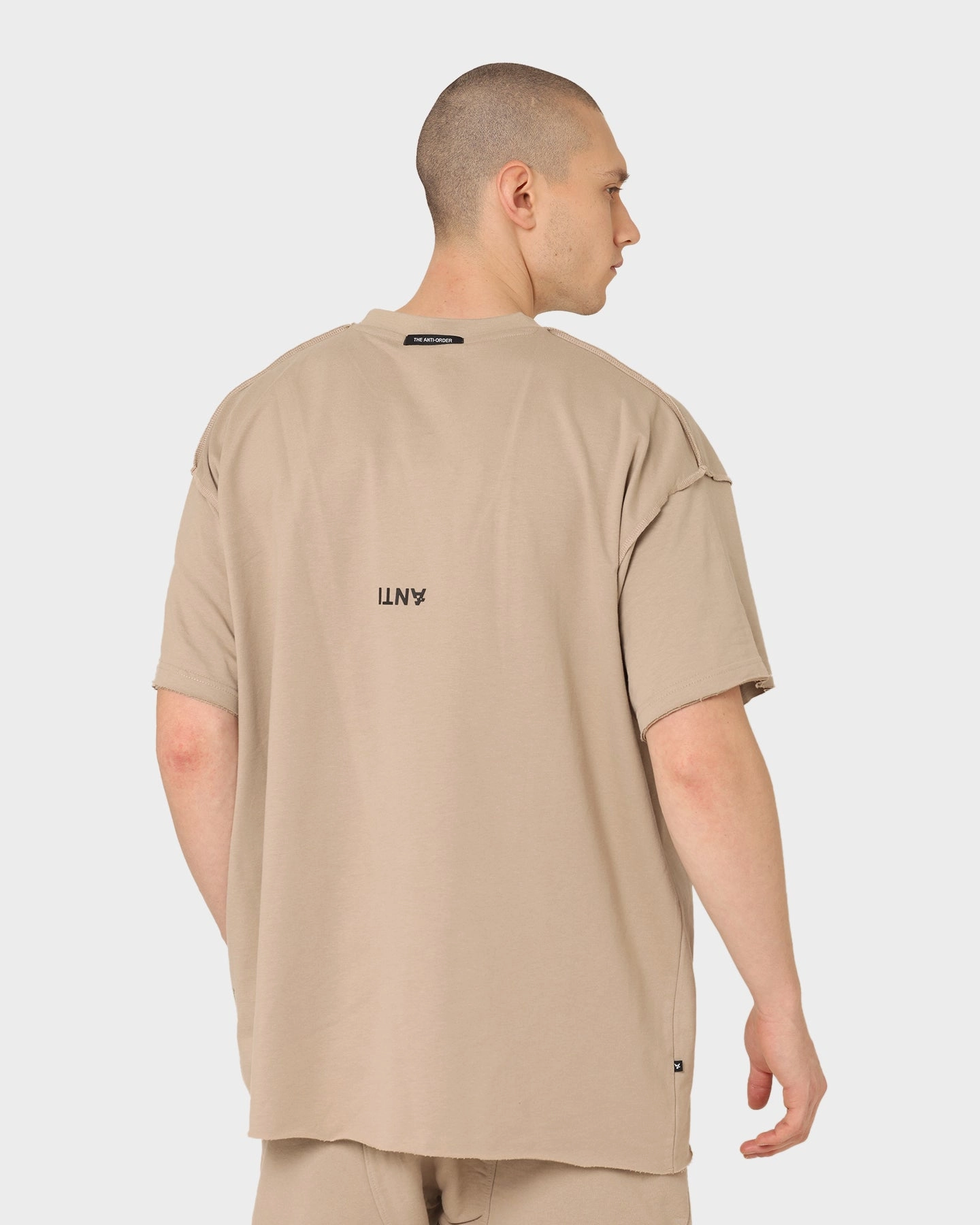 The Anti Order Anti Essential Oversized T-Shirt Bone Minimalist Design Leather combination