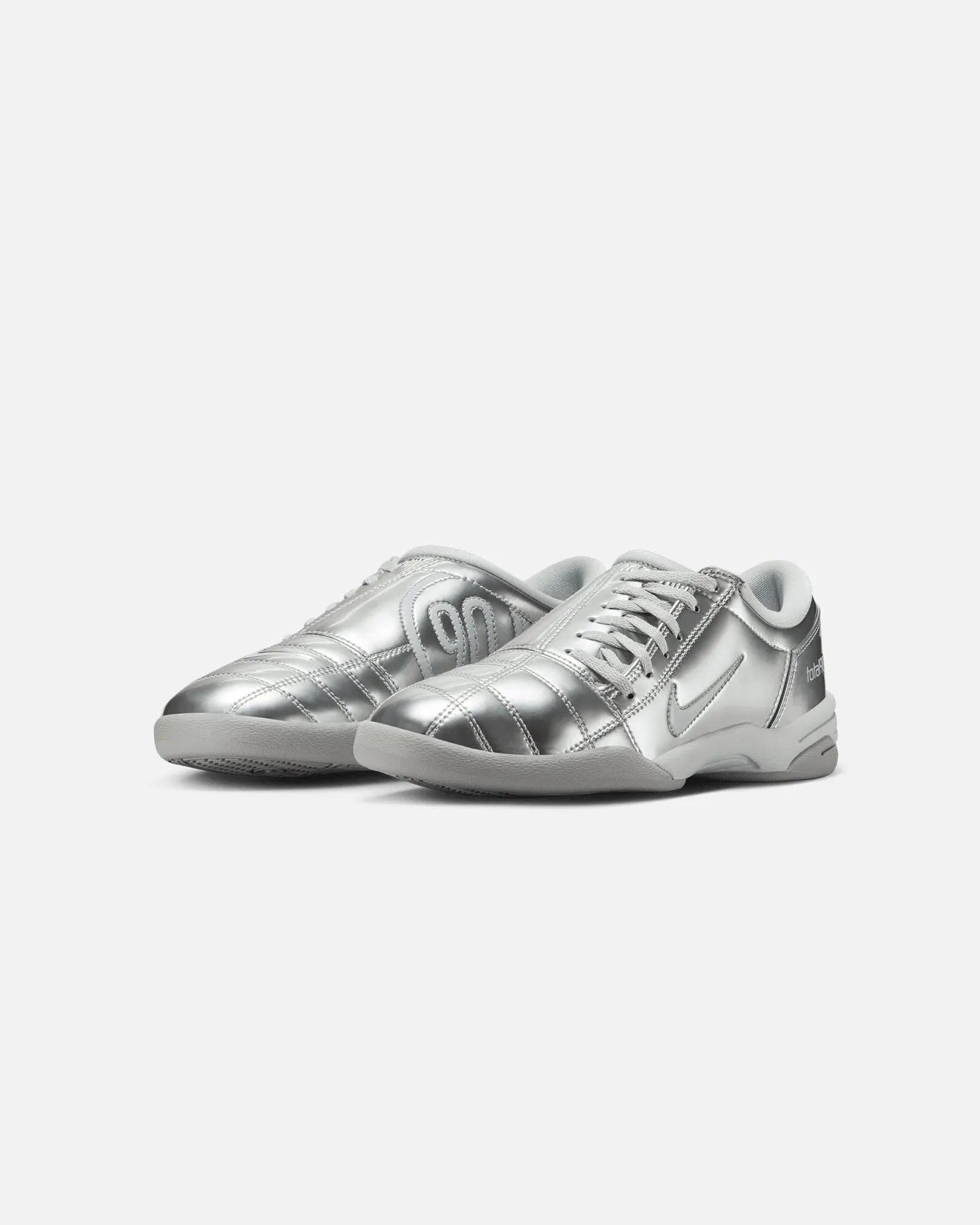 Torsional Stability Tech running in a concrete bridge area shoes Nike Women's Total 90 Platinum