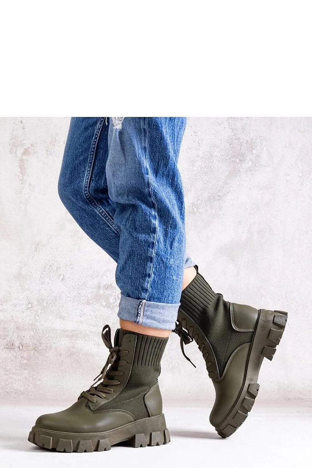 Green boots with elastic upper