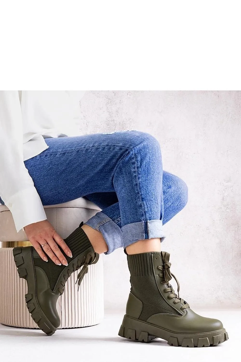Green boots with elastic upper