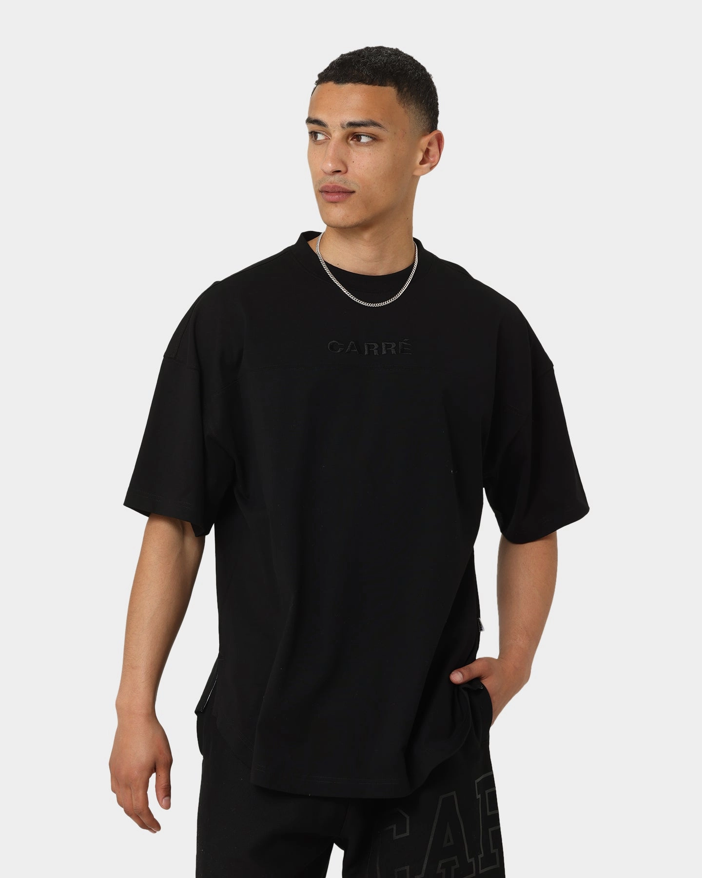 Boat neck style Carr?? Grid Iron Oversized T-Shirt Black