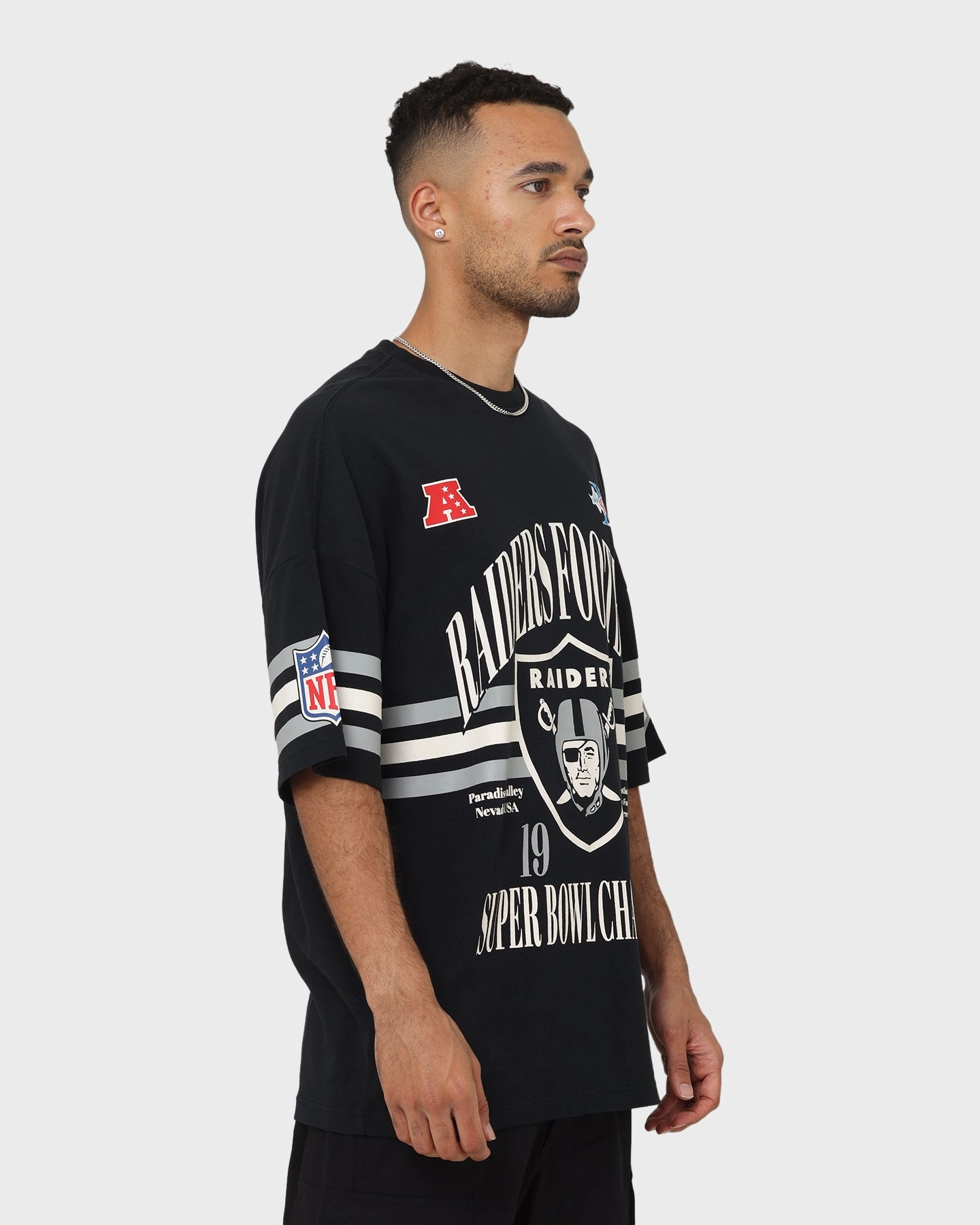 Majestic Athletic Las Vegas Raiders Champion Arch Stripe Oversized T-Shirt Faded Black City Fashion Look