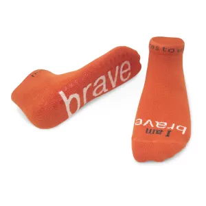 I am brave® orange low-cut socks with clear grips