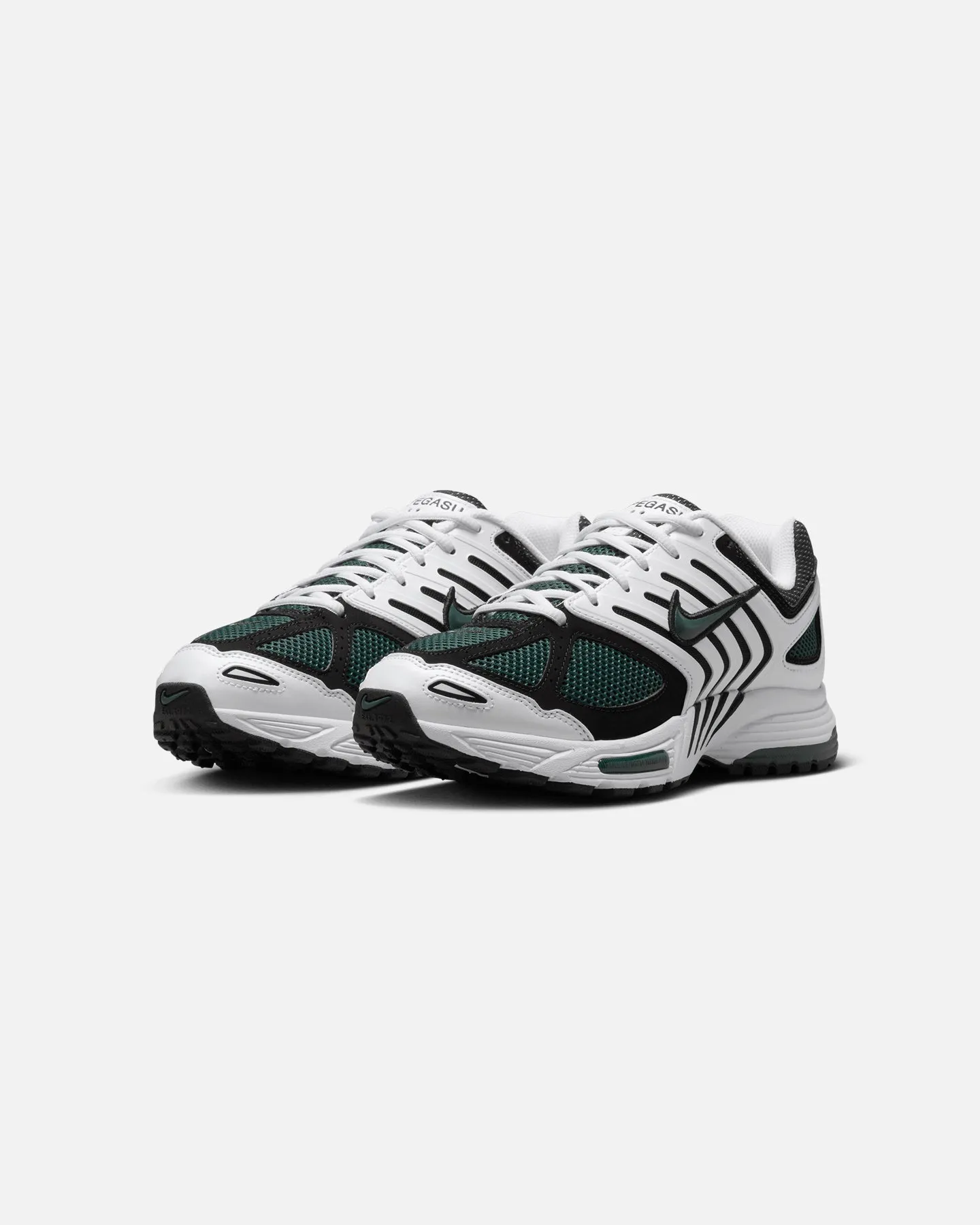 Nike Women's Air Pegasus 2005 White/Green running in a funicular area shoes