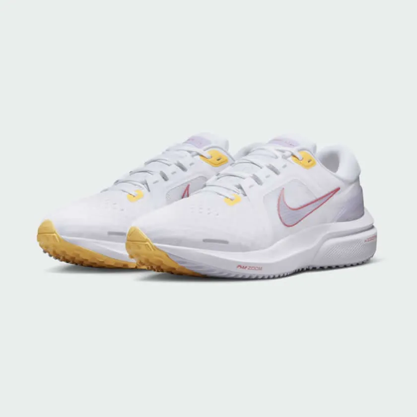 Nike Women's Air Zoom Vomero 16 DA7698 105 running with a visor