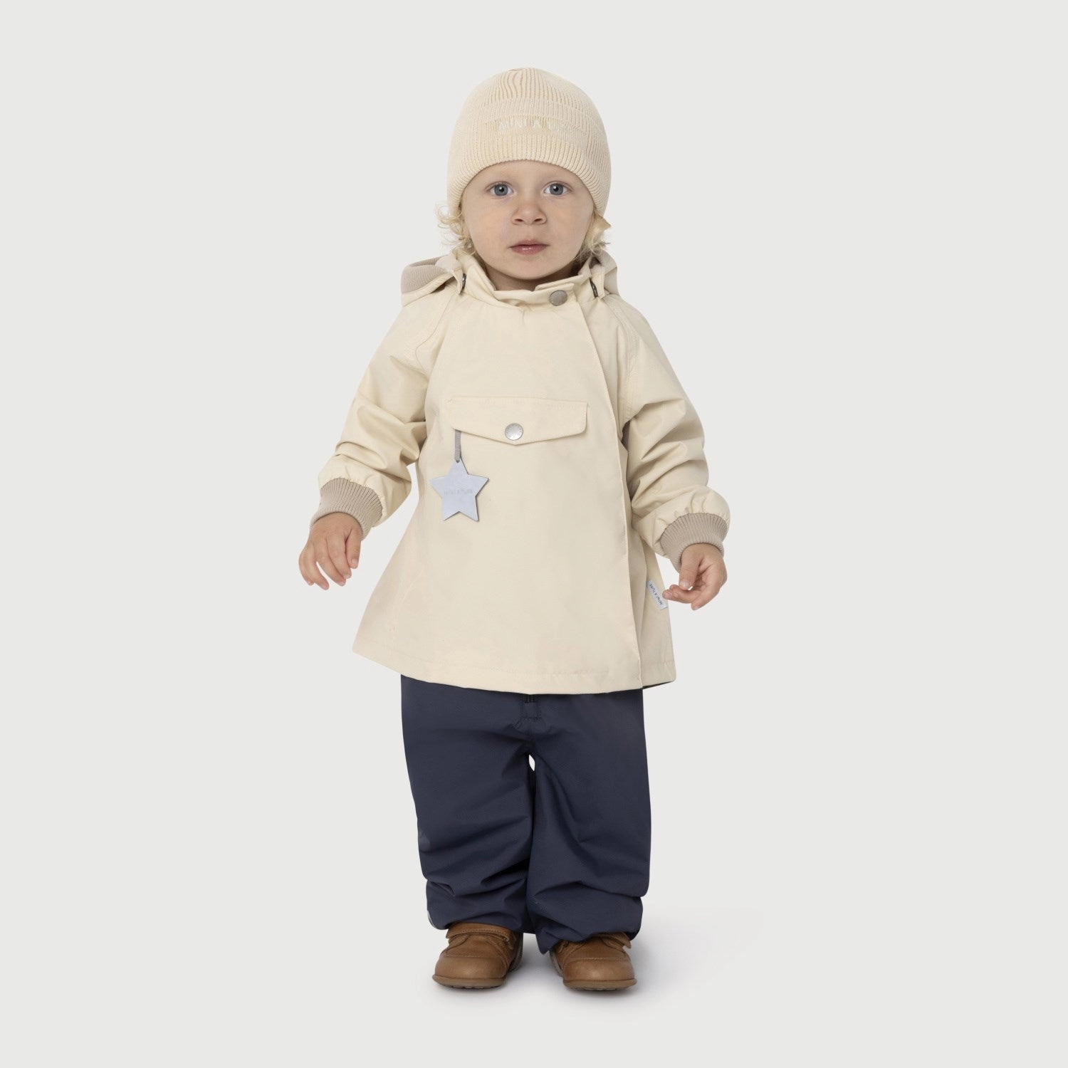 Mini A ture Sandshell Wai Spring Jacket. GRS Convertible Cuff System abrasion resistant coating