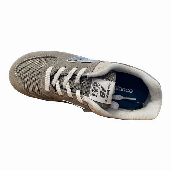 New Balance sneakers da ragazzo GC574GG grey running in the city windy weather