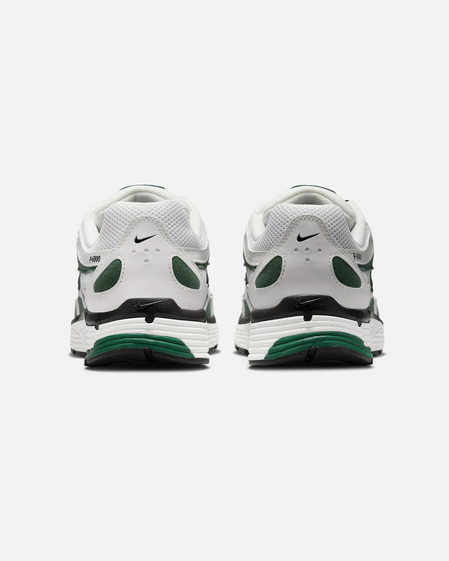 Nike Women's P-6000 Summit White running in a floodplain area shoes Internal Support Sling