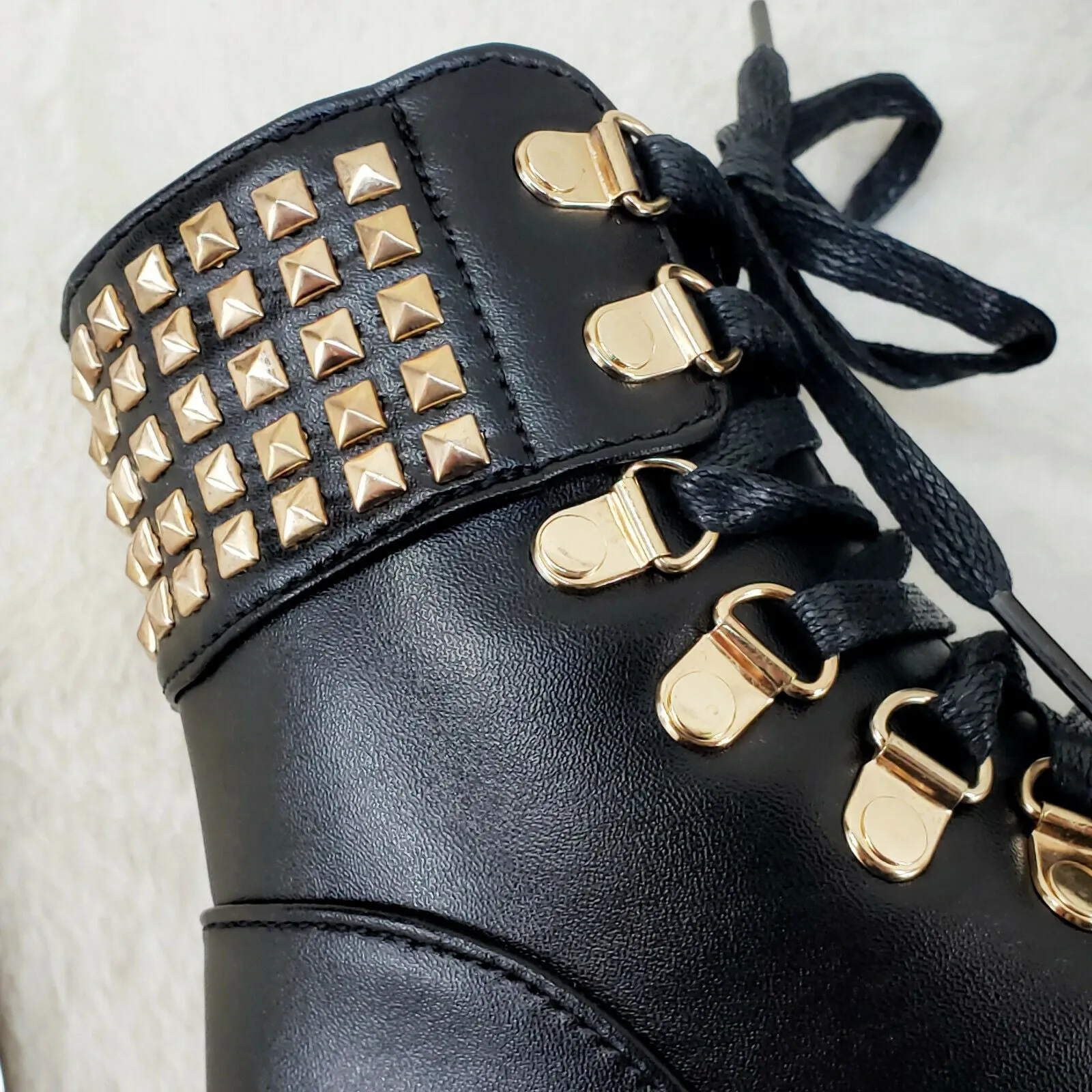 Nina Black Gold Tone Hardware Studded Combat Ankle Boots