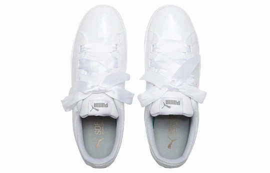 running on a grass track shoes multi - terrain running shoes Puma scarpa sneakers con zeppa da donna Vikky Platform Ribbon 366419 02 bianco