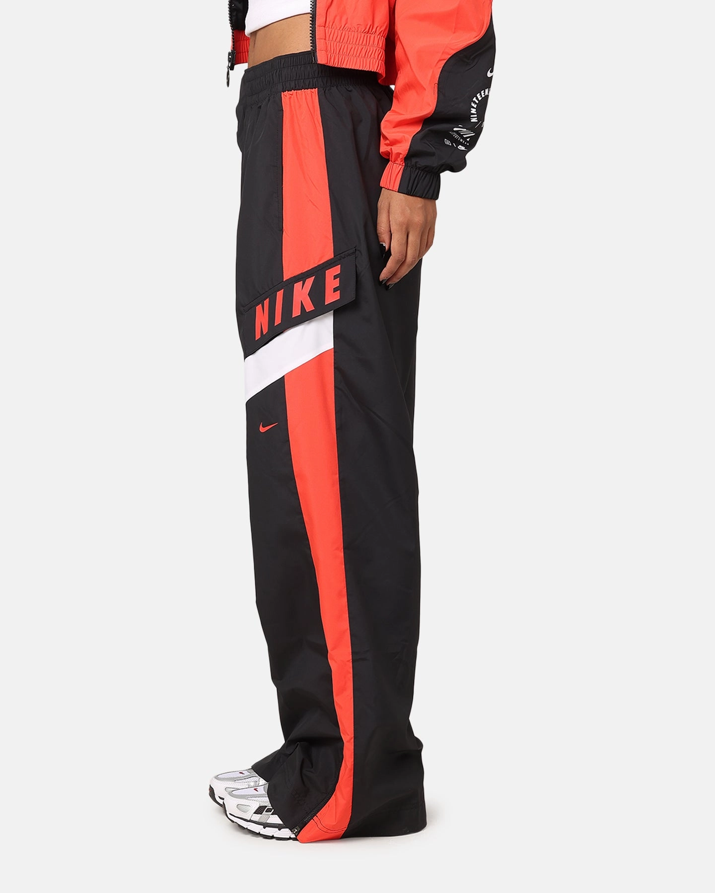 Nike Women's Sportswear Woven Oversized Pant Black/Light Crimson/White Flexible Wear
