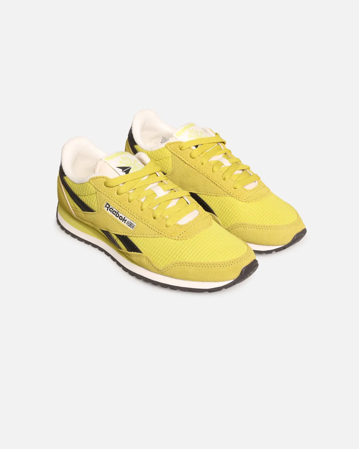 Reebok Women's Classic AZ Yellow running in dry weather