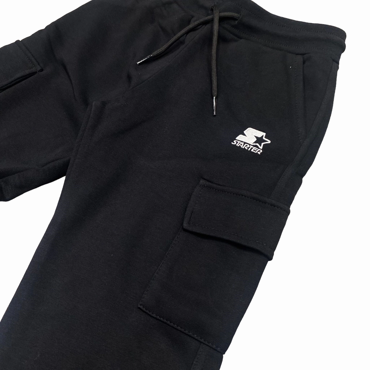 Starter pantalone sportivo con tasconi da ragazzo. Colore nero Cozy Performance