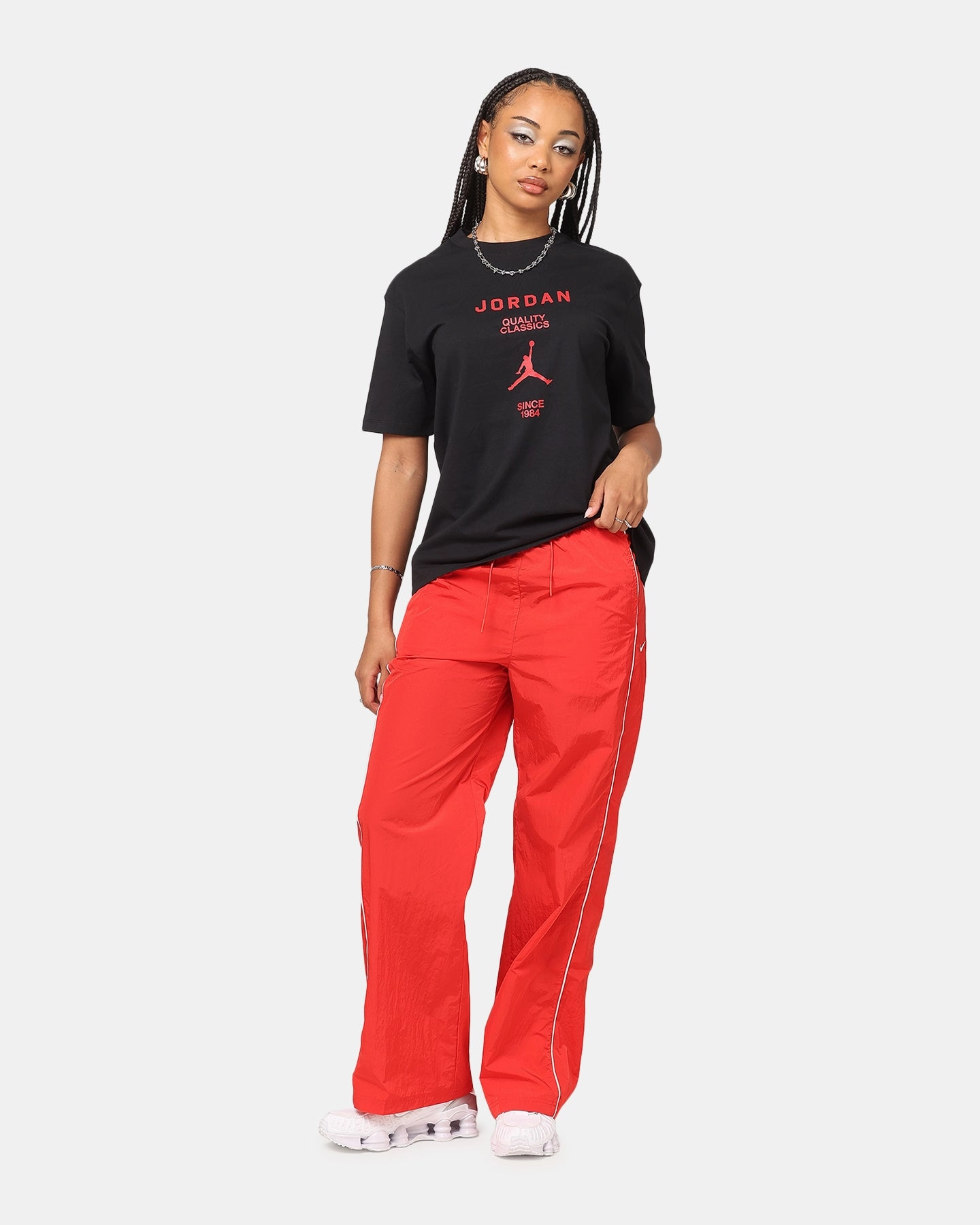 Nike Women's Sportswear High-Waisted Woven Open-Hem Pants University Red/Sail Quick Access Pockets elastic waistband