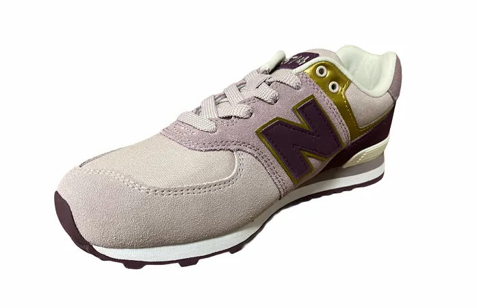 New Balance sneakers da ragazza  GC574MLG rosa running in a tropical area for sprints