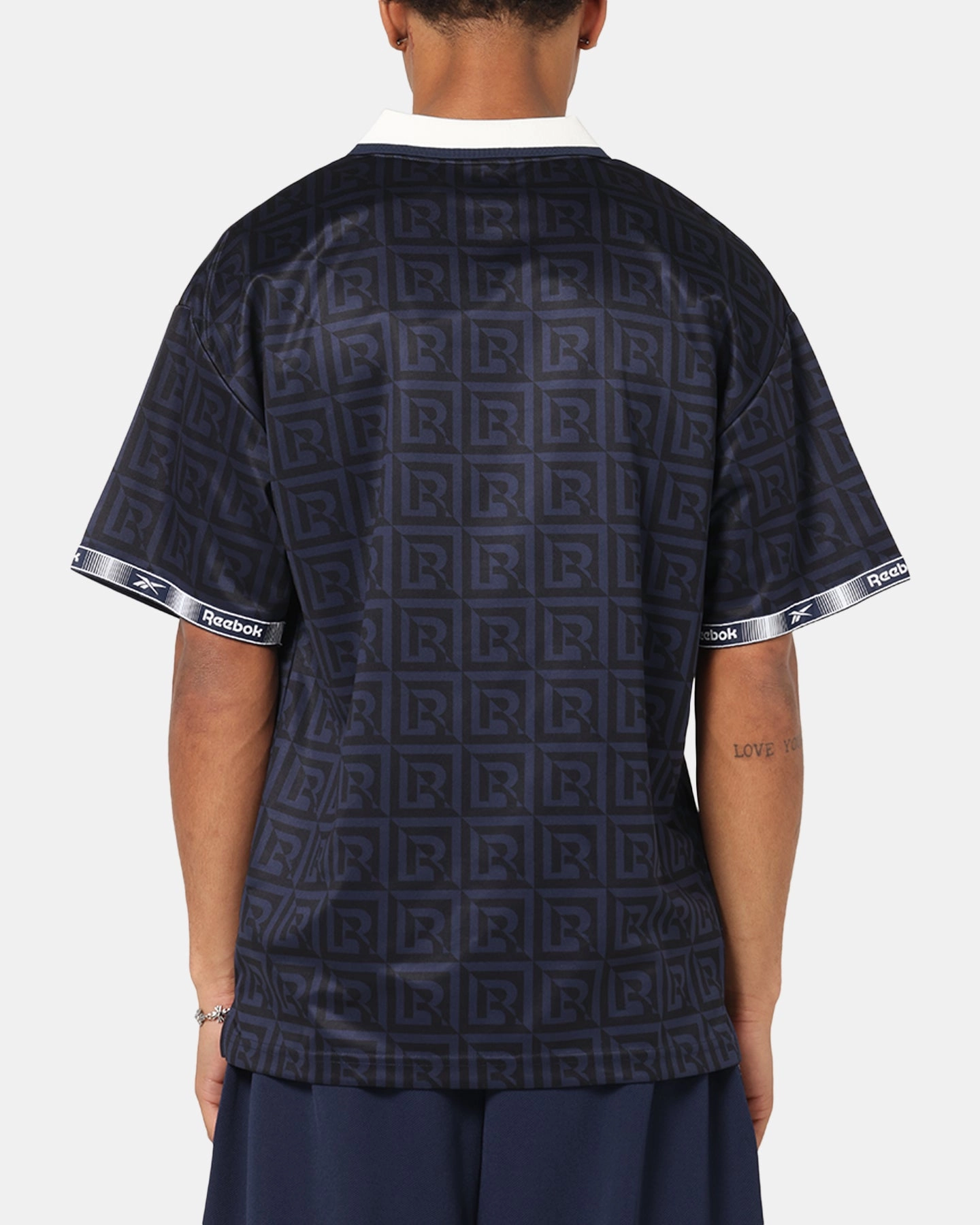 Dynamic Fit Engineering Reebok Monogram Football Polo T-Shirt Navy