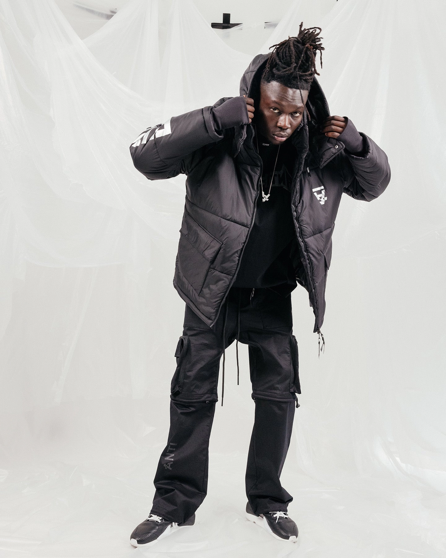 The Anti Order Hyphen ATD Puffer Jacket V2 Black/Silver Commuter Fit Period