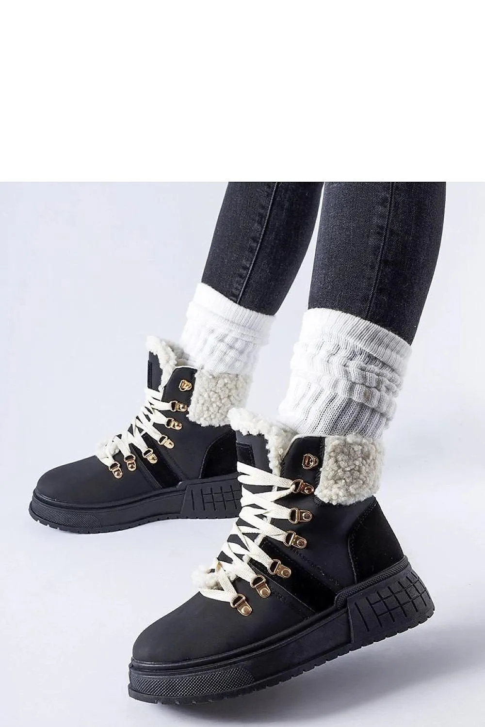 White work boots on the massive platform