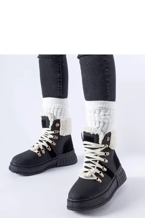 White work boots on the massive platform