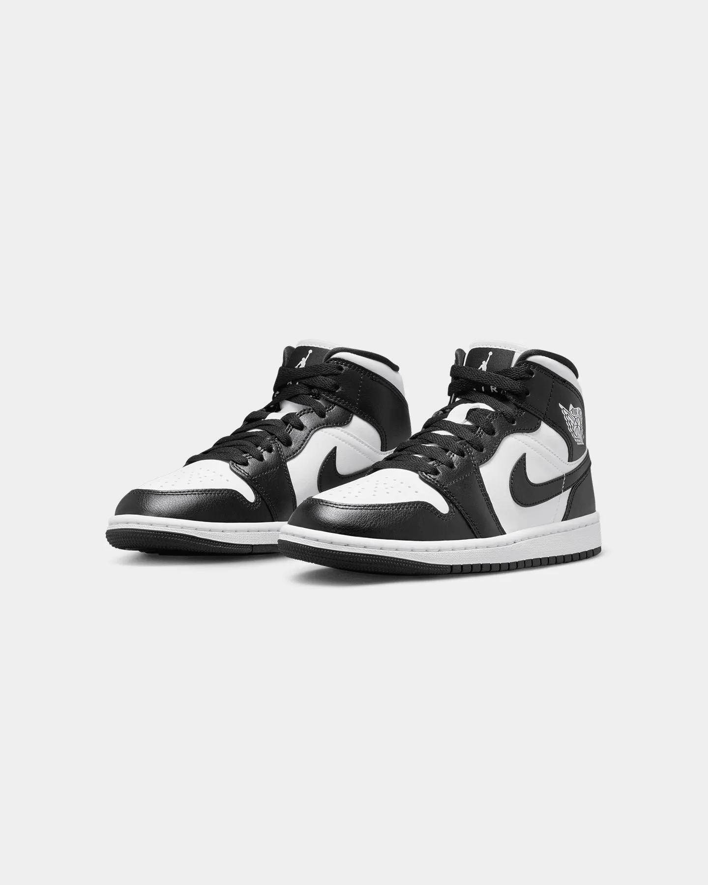 Dark - colored sandy terrain Jordan Women's Air Jordan 1 Mid "Panda" White/Black-White